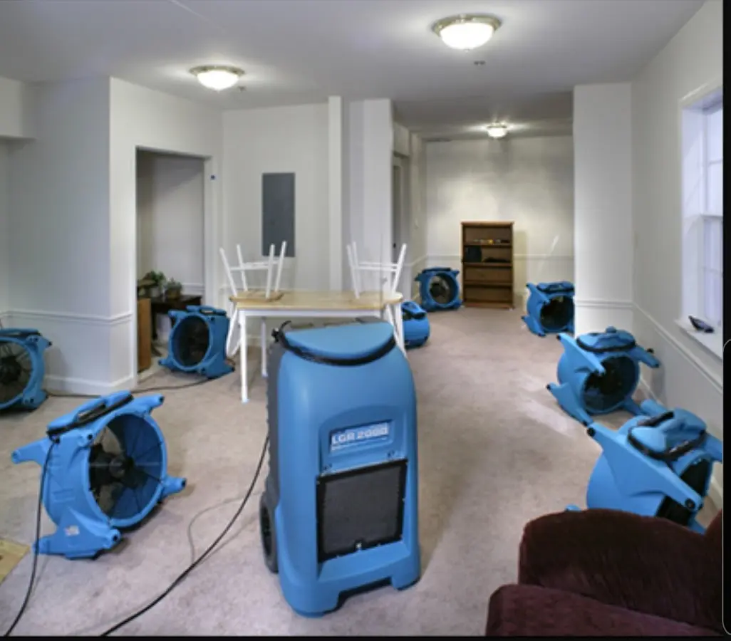 Air movers and dehumidifier setup for Water Damage Restoration in Attica